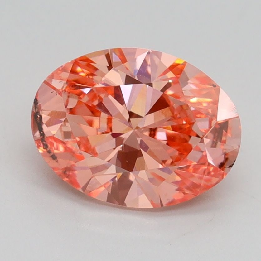 Loose Diamond - OVAL 1.7ct Fancy Vivid Pink SI2: Loose Diamond - OVAL 1.7ct Fancy Vivid Pink SI2 Source: This is a real non-mined Diamond that has been grown in a lab Shape: OVAL Carats: 1.7 Color: Fancy Vivid Pink Certification: IGI Video: