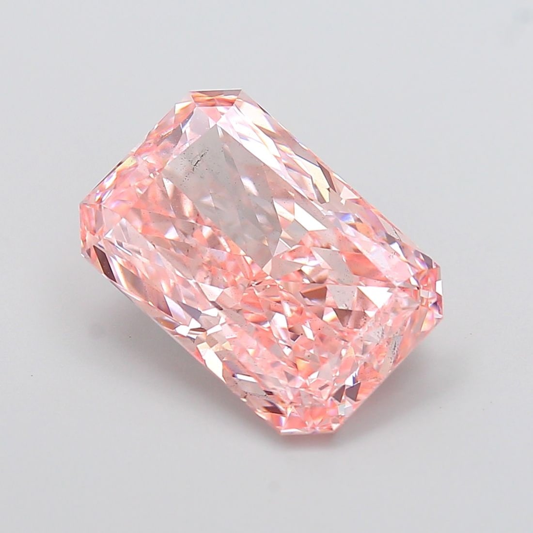 Loose Diamond - RADIANT 8.54ct Fancy Vivid Pink VS2: Loose Diamond - RADIANT 8.54ct Fancy Vivid Pink VS2 Source: This is a real non-mined Diamond that has been grown in a lab Shape: RADIANT Carats: 8.54 Color: Fancy Vivid Pink Certification: IGI Video: