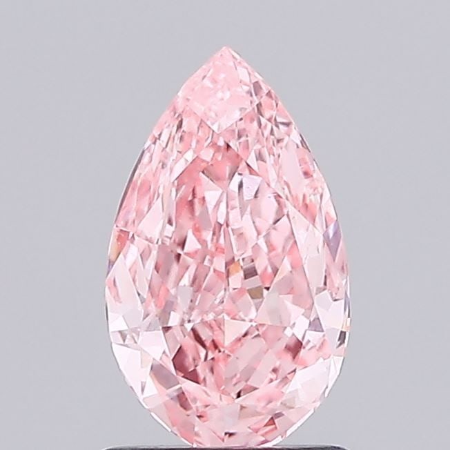 Loose Diamond - PEAR 0.94ct Fancy Vivid Pink VS1: Loose Diamond - PEAR 0.94ct Fancy Vivid Pink VS1 Source: This is a real non-mined Diamond that has been grown in a lab Shape: PEAR Carats: 0.94 Color: Fancy Vivid Pink Certification: IGI Video:
