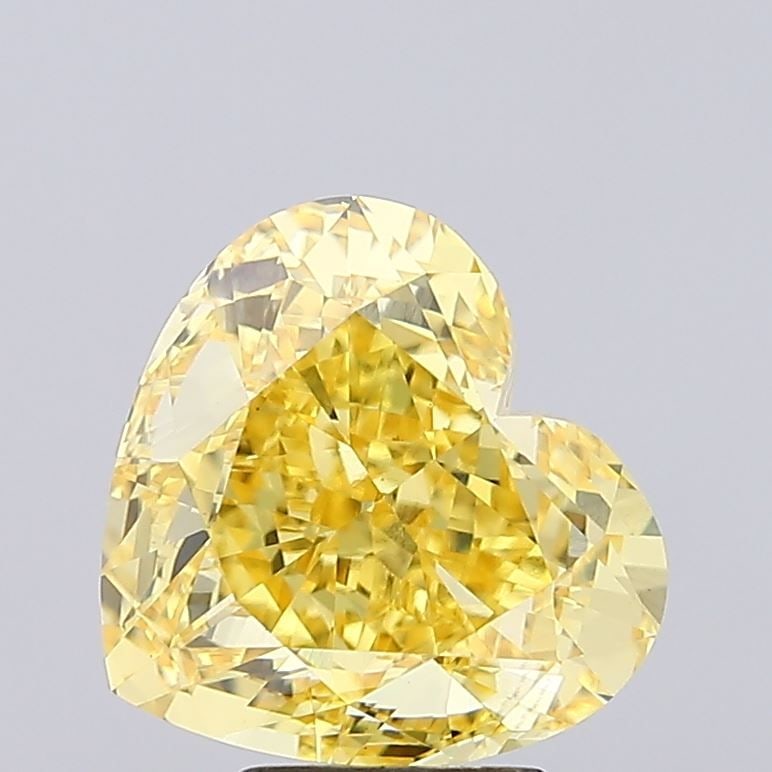 Loose Diamond - HEART 5.65ct Fancy Vivid Yellow VS1: Loose Diamond - HEART 5.65ct Fancy Vivid Yellow VS1 Source: This is a real non-mined Diamond that has been grown in a lab Shape: HEART Carats: 5.65 Color: Fancy Vivid Yellow Certification: IGI Video: