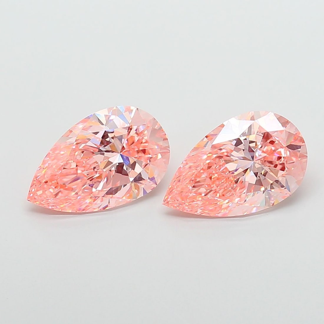 Loose Diamond - PEAR 5.06ct Fancy Vivid Pink VS1: Loose Diamond - PEAR 5.06ct Fancy Vivid Pink VS1 Source: This is a real non-mined Diamond that has been grown in a lab Shape: PEAR Carats: 5.06 Color: Fancy Vivid Pink Certification: IGI Video: