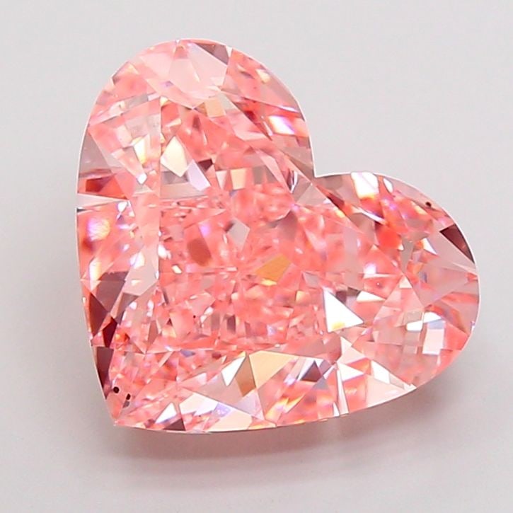 Loose Diamond - HEART 10.1ct Fancy Vivid Pink VS2: Loose Diamond - HEART 10.1ct Fancy Vivid Pink VS2 Source: This is a real non-mined Diamond that has been grown in a lab Shape: HEART Carats: 10.1 Color: Fancy Vivid Pink Certification: IGI Video: