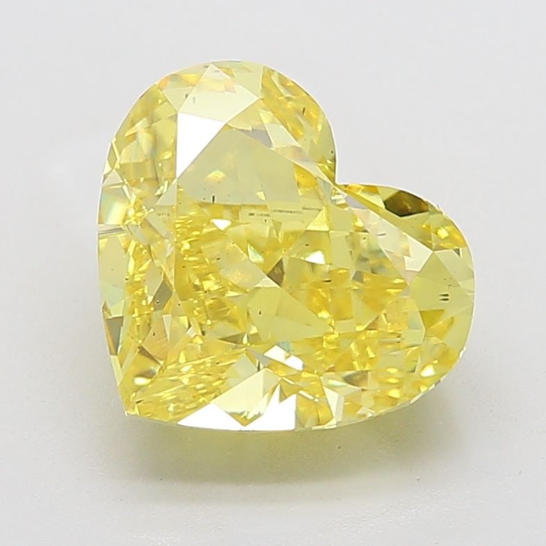 Loose Diamond - HEART 7.51ct Fancy Vivid Yellow SI1: Loose Diamond - HEART 7.51ct Fancy Vivid Yellow SI1 Source: This is a real non-mined Diamond that has been grown in a lab Shape: HEART Carats: 7.51 Color: Fancy Vivid Yellow Certification: IGI Video: