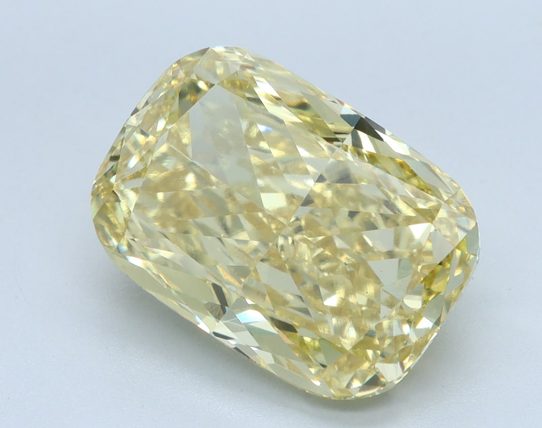 Loose Diamond - CUSHION 6.54ct YELLOW VS1: Loose Diamond - CUSHION 6.54ct YELLOW VS1 Source: This is a real non-mined Diamond that has been grown in a lab Shape: CUSHION Carats: 6.54 Color: YELLOW Clarity: VS1 Certification: IGI Condition: Pre
