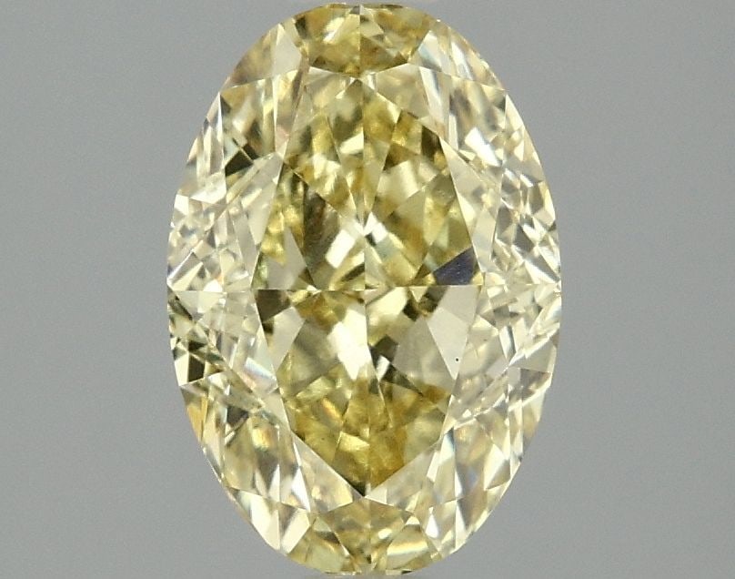 Loose Diamond - OVAL 2.1ct Fancy Intense Yellow VS1: Loose Diamond - OVAL 2.1ct Fancy Intense Yellow VS1 Source: This is a real non-mined Diamond that has been grown in a lab Shape: OVAL Carats: 2.1 Color: Fancy Intense Yellow Certification: IGI Video: