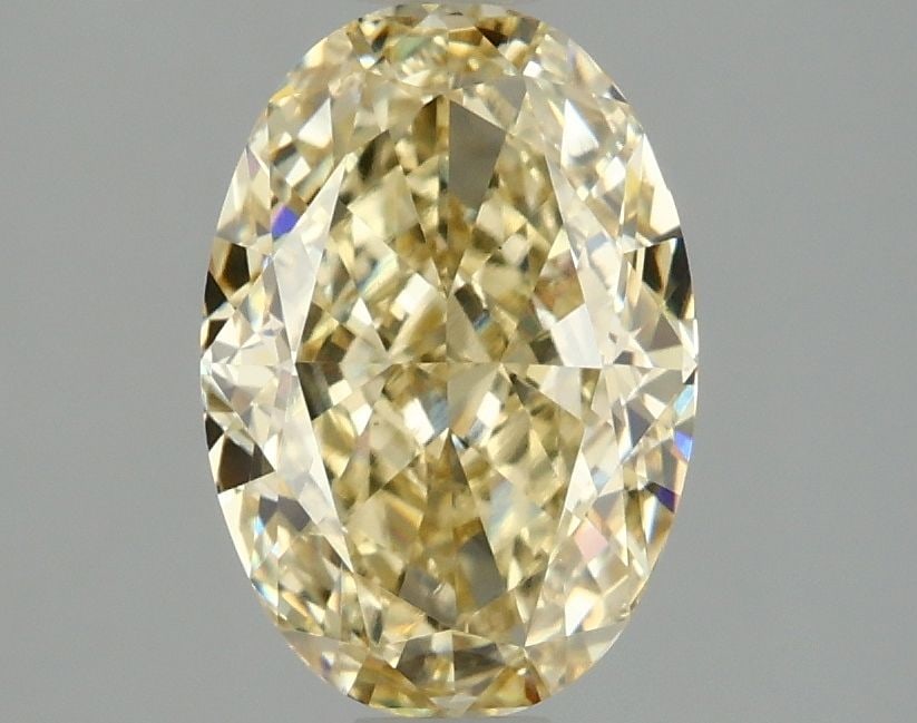 Loose Diamond - OVAL 2.1ct Fancy Intense Yellow VS1: Loose Diamond - OVAL 2.1ct Fancy Intense Yellow VS1 Source: This is a real non-mined Diamond that has been grown in a lab Shape: OVAL Carats: 2.1 Color: Fancy Intense Yellow Certification: IGI Video: