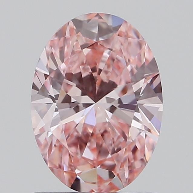 Loose Diamond - OVAL 0.91ct Fancy Vivid Pink VS1: Loose Diamond - OVAL 0.91ct Fancy Vivid Pink VS1 Source: This is a real non-mined Diamond that has been grown in a lab Shape: OVAL Carats: 0.91 Color: Fancy Vivid Pink Certification: IGI Video: