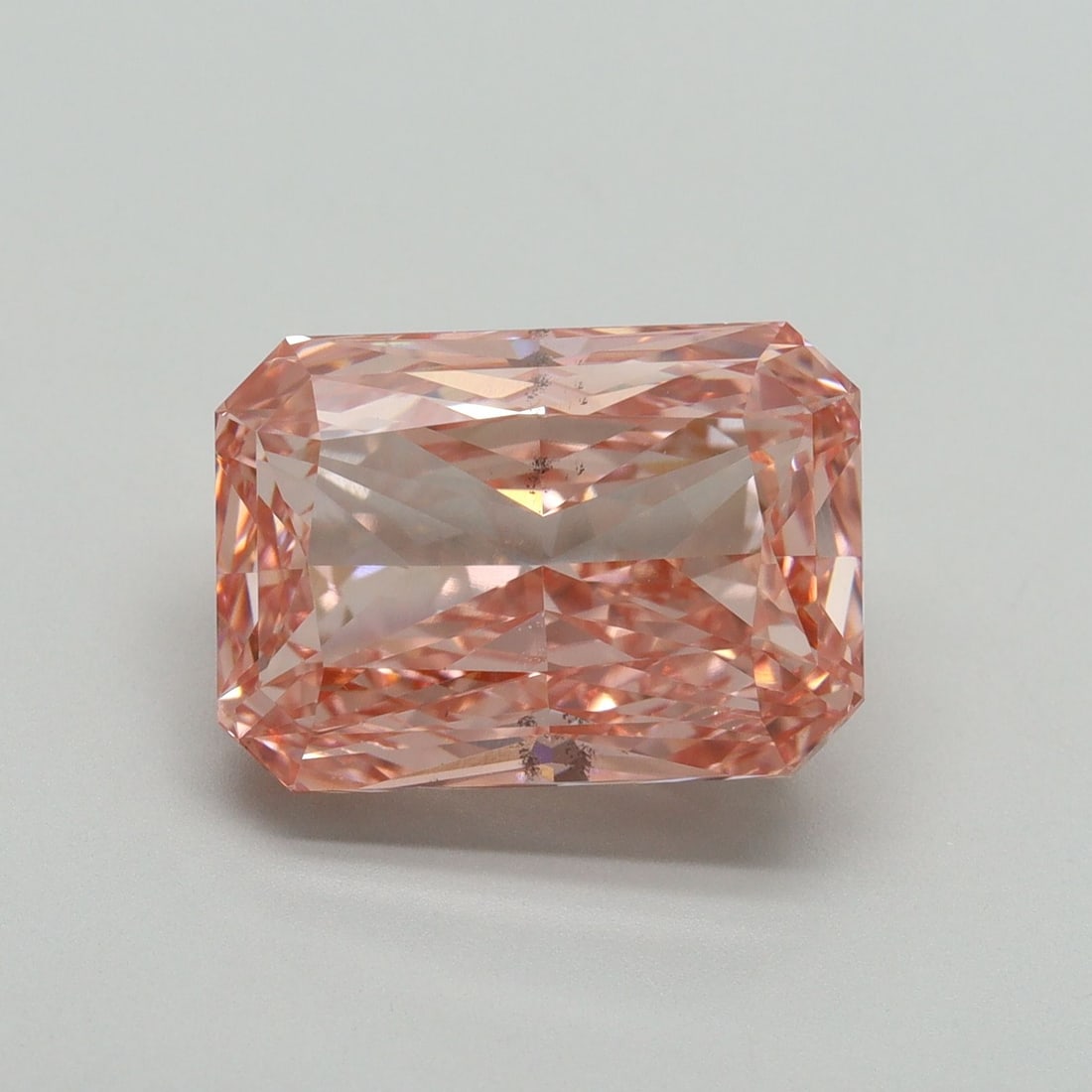 Loose Diamond - RADIANT 7.07ct Fancy Vivid Pink VS2: Loose Diamond - RADIANT 7.07ct Fancy Vivid Pink VS2 Source: This is a real non-mined Diamond that has been grown in a lab Shape: RADIANT Carats: 7.07 Color: Fancy Vivid Pink Certification: IGI Video: