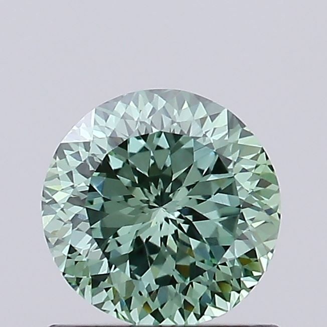 Loose Diamond - ROUND 0.75ct Fancy Vivid Green VVS2: Loose Diamond - ROUND 0.75ct Fancy Vivid Green VVS2 Source: This is a real non-mined Diamond that has been grown in a lab Shape: ROUND Carats: 0.75 Color: Fancy Vivid Green Certification: IGI Video: