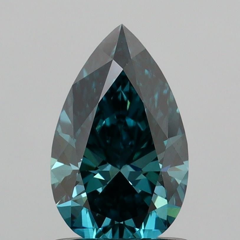 Loose Diamond - PEAR 0.91ct Fancy Vivid Greenish Blue VS1: Loose Diamond - PEAR 0.91ct Fancy Vivid Greenish Blue VS1 Source: This is a real non-mined Diamond that has been grown in a lab Shape: PEAR Carats: 0.91 Color: Fancy Vivid Greenish Blue Certification: