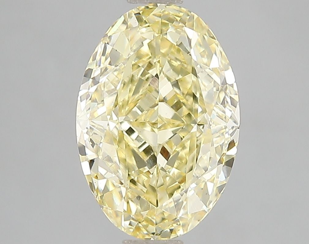 Loose Diamond - OVAL 3.1ct Fancy Vivid Yellow VS2: Loose Diamond - OVAL 3.1ct Fancy Vivid Yellow VS2 Source: This is a real non-mined Diamond that has been grown in a lab Shape: OVAL Carats: 3.1 Color: Fancy Vivid Yellow Certification: IGI Video: