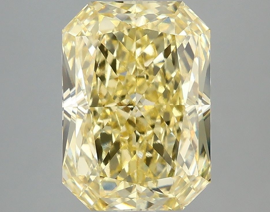 Loose Diamond - RADIANT 4.09ct Fancy Vivid Yellow VVS2: Loose Diamond - RADIANT 4.09ct Fancy Vivid Yellow VVS2 Source: This is a real non-mined Diamond that has been grown in a lab Shape: RADIANT Carats: 4.09 Color: Fancy Vivid Yellow Certification: IGI Vi