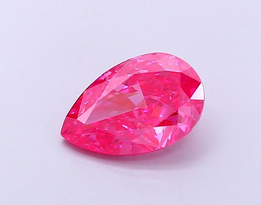 Loose Diamond - PEAR 1.44ct Fancy Vivid Pink VS1: Loose Diamond - PEAR 1.44ct Fancy Vivid Pink VS1 Source: This is a real non-mined Diamond that has been grown in a lab Shape: PEAR Carats: 1.44 Color: Fancy Vivid Pink Certification: IGI Video:
