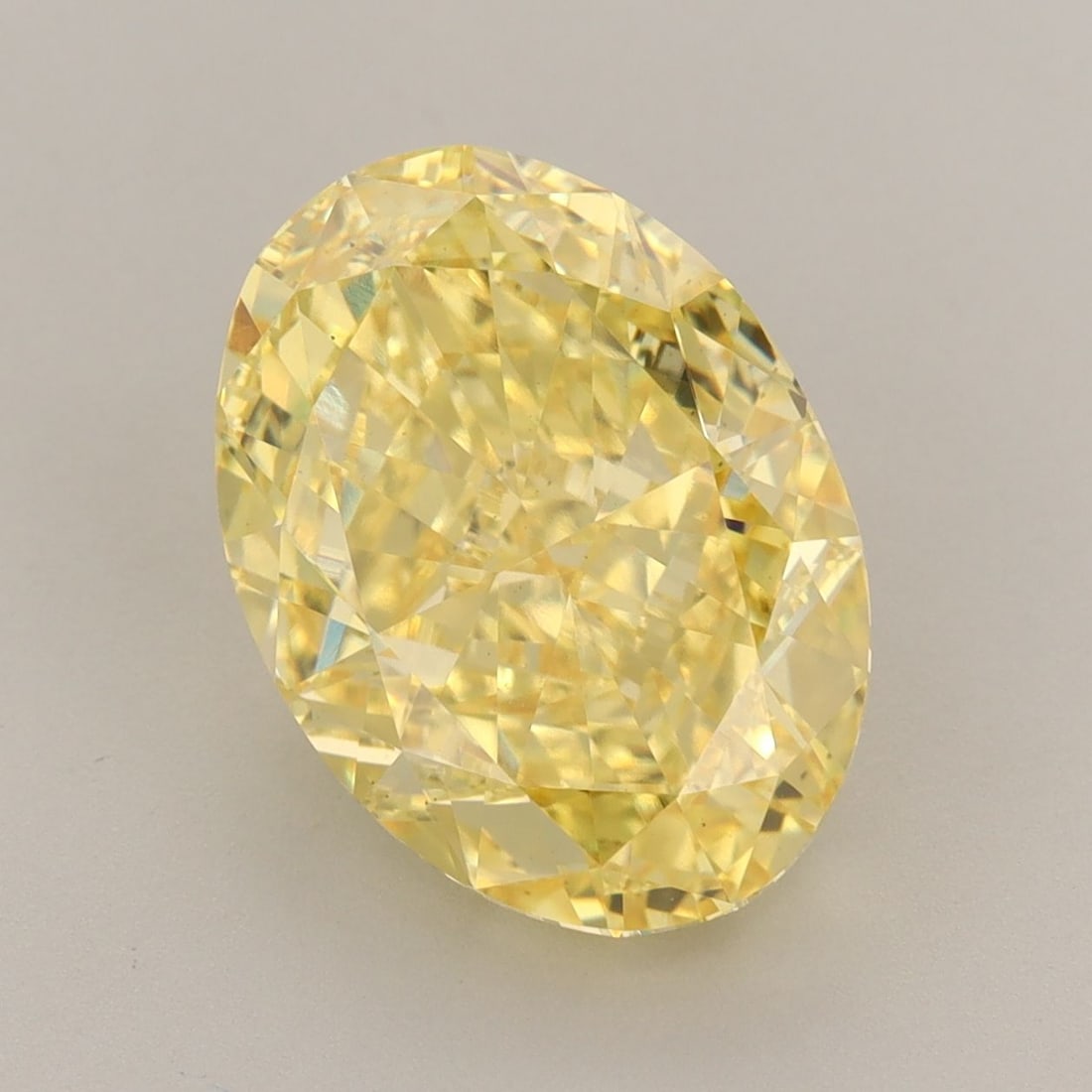 Loose Diamond - OVAL 6.27ct Fancy Vivid Yellow VS1: Loose Diamond - OVAL 6.27ct Fancy Vivid Yellow VS1 Source: This is a real non-mined Diamond that has been grown in a lab Shape: OVAL Carats: 6.27 Color: Fancy Vivid Yellow Certification: IGI Video: