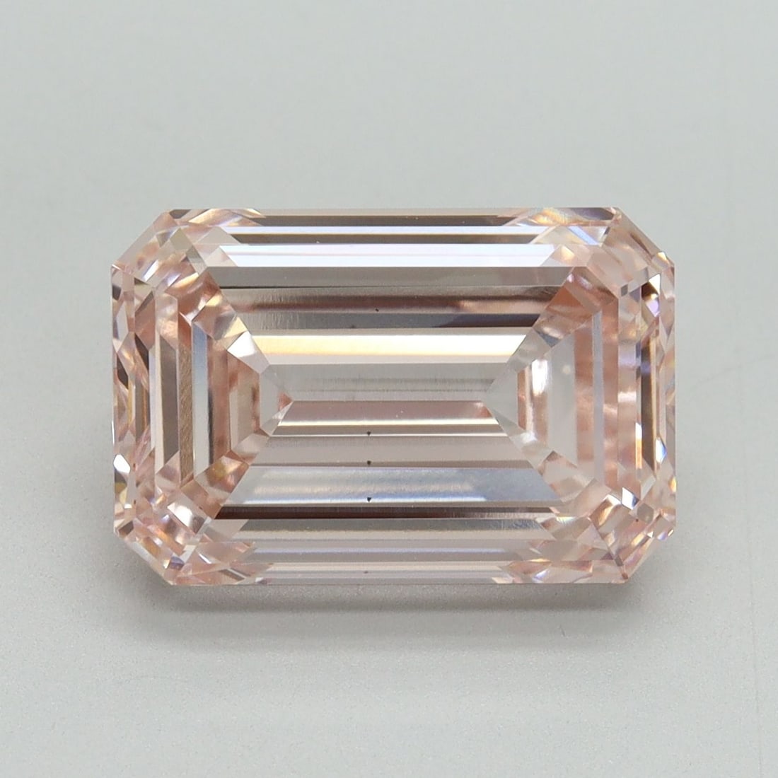 Loose Diamond - EMERALD 5.55ct Fancy Intense Pink VS1: Loose Diamond - EMERALD 5.55ct Fancy Intense Pink VS1 Source: This is a real non-mined Diamond that has been grown in a lab Shape: EMERALD Carats: 5.55 Color: Fancy Intense Pink Certification: IGI Vid