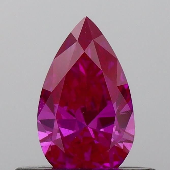 Loose Diamond - PEAR 0.41ct Fancy Vivid Pink VS1: Loose Diamond - PEAR 0.41ct Fancy Vivid Pink VS1 Source: This is a real non-mined Diamond that has been grown in a lab Shape: PEAR Carats: 0.41 Color: Fancy Vivid Pink Certification: IGI Video: