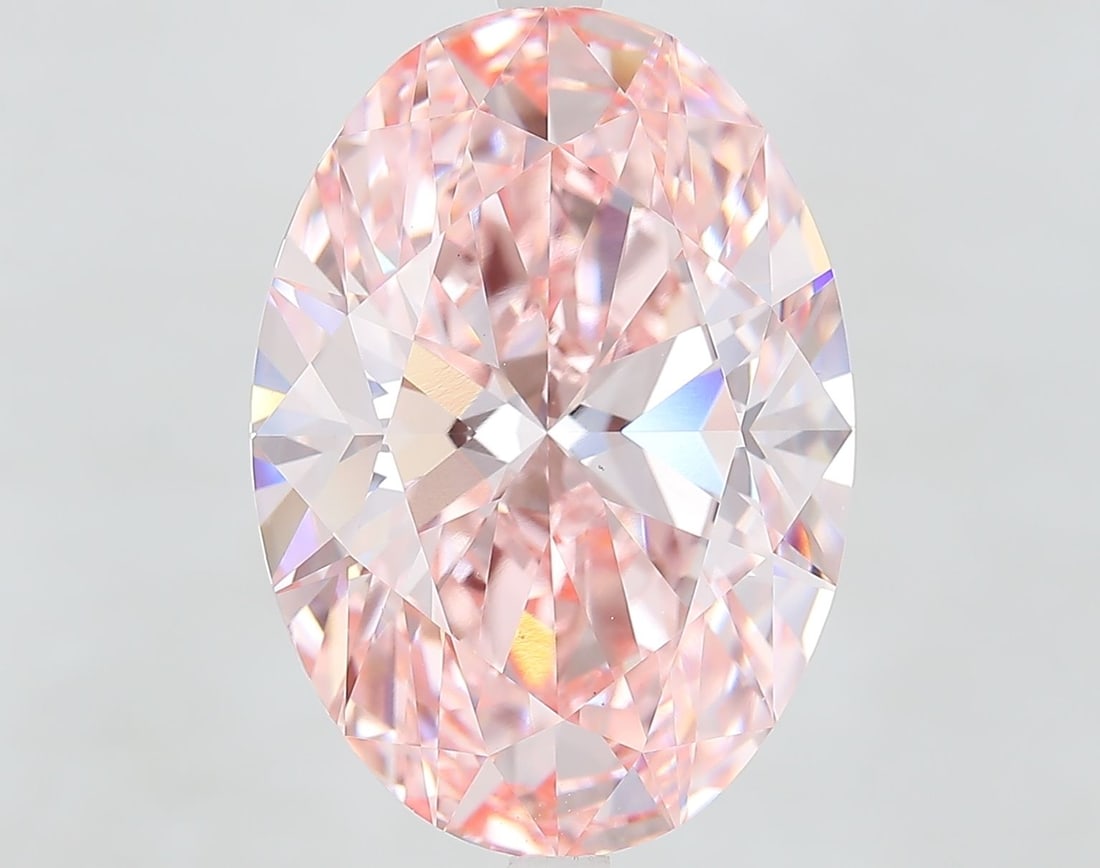 Loose Diamond - OVAL 10.85ct Fancy Vivid Pink VS1: Loose Diamond - OVAL 10.85ct Fancy Vivid Pink VS1 Source: This is a real non-mined Diamond that has been grown in a lab Shape: OVAL Carats: 10.85 Color: Fancy Vivid Pink Certification: IGI Video: