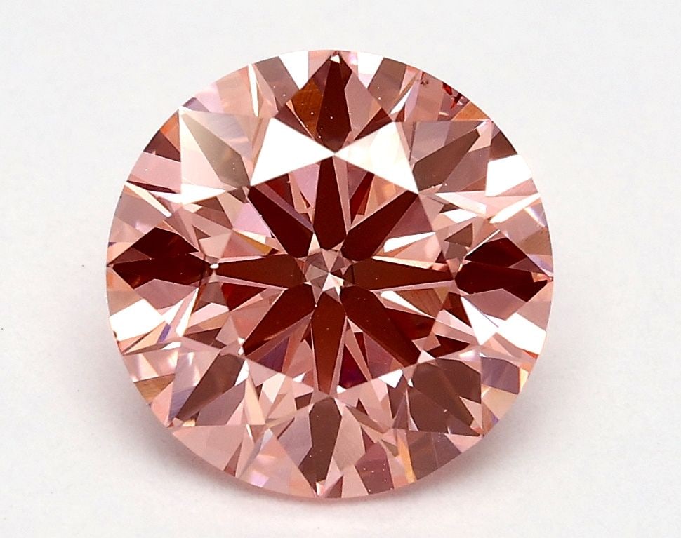 Ideal Loose Diamond - ROUND 1.71ct Fancy Vivid Pink VS2: Ideal Loose Diamond - ROUND 1.71ct Fancy Vivid Pink VS2 Source: This is a real non-mined Diamond that has been grown in a lab Shape: ROUND Carats: 1.71 Color: Fancy Vivid Pink Certification: IGI Video