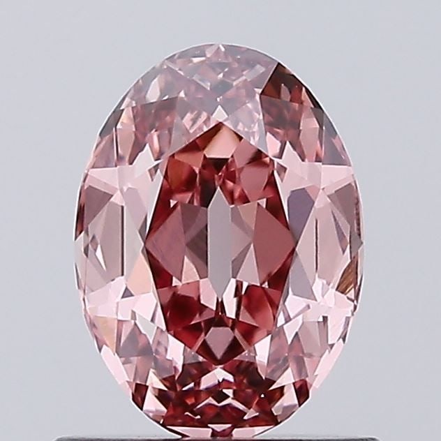Loose Diamond - OVAL 1.04ct Fancy Pinkish Brown VVS2: Loose Diamond - OVAL 1.04ct Fancy Pinkish Brown VVS2 Source: This is a real non-mined Diamond that has been grown in a lab Shape: OVAL Carats: 1.04 Color: Fancy Pinkish Brown Certification: IGI Video: