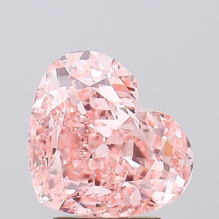 Loose Diamond - HEART 3.21ct Fancy Vivid Pink VVS2: Loose Diamond - HEART 3.21ct Fancy Vivid Pink VVS2 Source: This is a real non-mined Diamond that has been grown in a lab Shape: HEART Carats: 3.21 Color: Fancy Vivid Pink Certification: IGI Video: