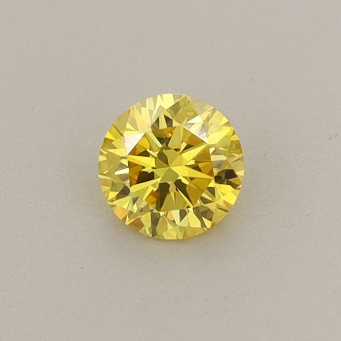 Loose Diamond - ROUND 0.28ct Fancy Vivid Yellow VS1: Loose Diamond - ROUND 0.28ct Fancy Vivid Yellow VS1 Source: This is a real non-mined Diamond that has been grown in a lab Shape: ROUND Carats: 0.28 Color: Fancy Vivid Yellow Certification: IGI Video: