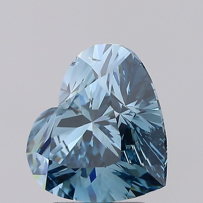 Loose Diamond - HEART 3.01ct Fancy Vivid Blue SI1: Loose Diamond - HEART 3.01ct Fancy Vivid Blue SI1 Source: This is a real non-mined Diamond that has been grown in a lab Shape: HEART Carats: 3.01 Color: Fancy Vivid Blue Certification: IGI Video:
