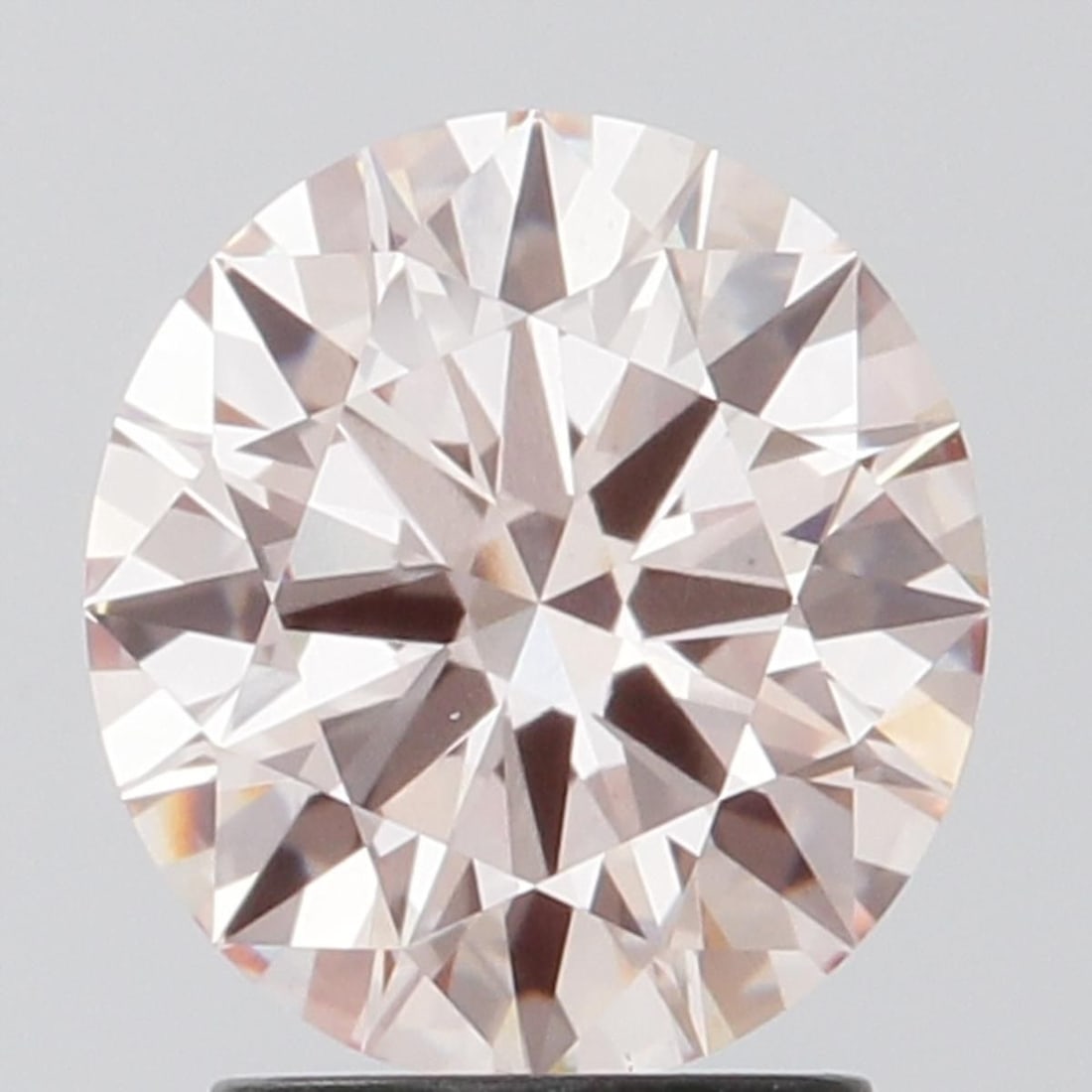 Loose Diamond - ROUND 1.94ct Fancy Pink VS1: Loose Diamond - ROUND 1.94ct Fancy Pink VS1 Source: This is a real non-mined Diamond that has been grown in a lab Shape: ROUND Carats: 1.94 Color: Fancy Pink Certification: IGI Video: