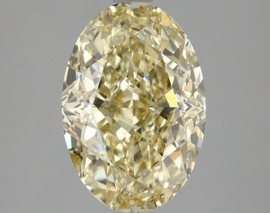 Loose Diamond - OVAL 3.1ct Fancy Intense Yellow VVS2: Loose Diamond - OVAL 3.1ct Fancy Intense Yellow VVS2 Source: This is a real non-mined Diamond that has been grown in a lab Shape: OVAL Carats: 3.1 Color: Fancy Intense Yellow Certification: IGI Video: