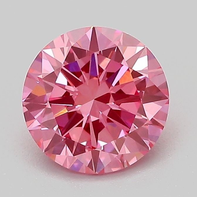 Loose Diamond - ROUND 1.32ct Fancy Vivid Pink VS1: Loose Diamond - ROUND 1.32ct Fancy Vivid Pink VS1 Source: This is a real non-mined Diamond that has been grown in a lab Shape: ROUND Carats: 1.32 Color: Fancy Vivid Pink Certification: IGI PLEASE NOTE
