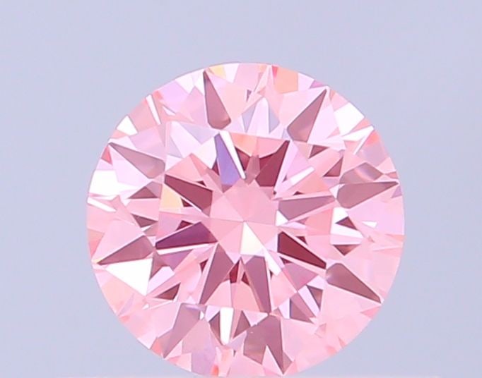 Ideal Loose Diamond - ROUND 0.46ct Fancy Vivid Pink VVS2: Ideal Loose Diamond - ROUND 0.46ct Fancy Vivid Pink VVS2 Source: This is a real non-mined Diamond that has been grown in a lab Shape: ROUND Carats: 0.46 Color: Fancy Vivid Pink Certification: IGI Vide