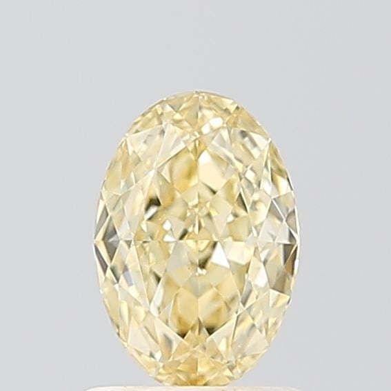 Loose Diamond - OVAL 0.91ct Fancy Yellow VS1: Loose Diamond - OVAL 0.91ct Fancy Yellow VS1 Source: This is a real non-mined Diamond that has been grown in a lab Shape: OVAL Carats: 0.91 Color: Fancy Yellow Certification: IGI Video: