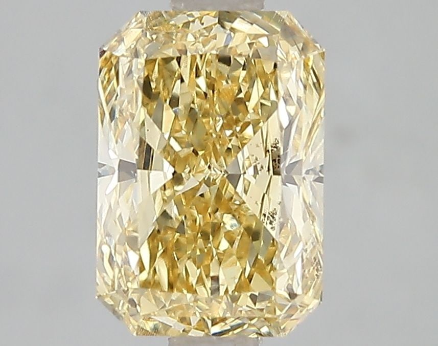 Loose Diamond - RADIANT 2.02ct Fancy Vivid Yellow VS2: Loose Diamond - RADIANT 2.02ct Fancy Vivid Yellow VS2 Source: This is a real non-mined Diamond that has been grown in a lab Shape: RADIANT Carats: 2.02 Color: Fancy Vivid Yellow Certification: IGI Vid