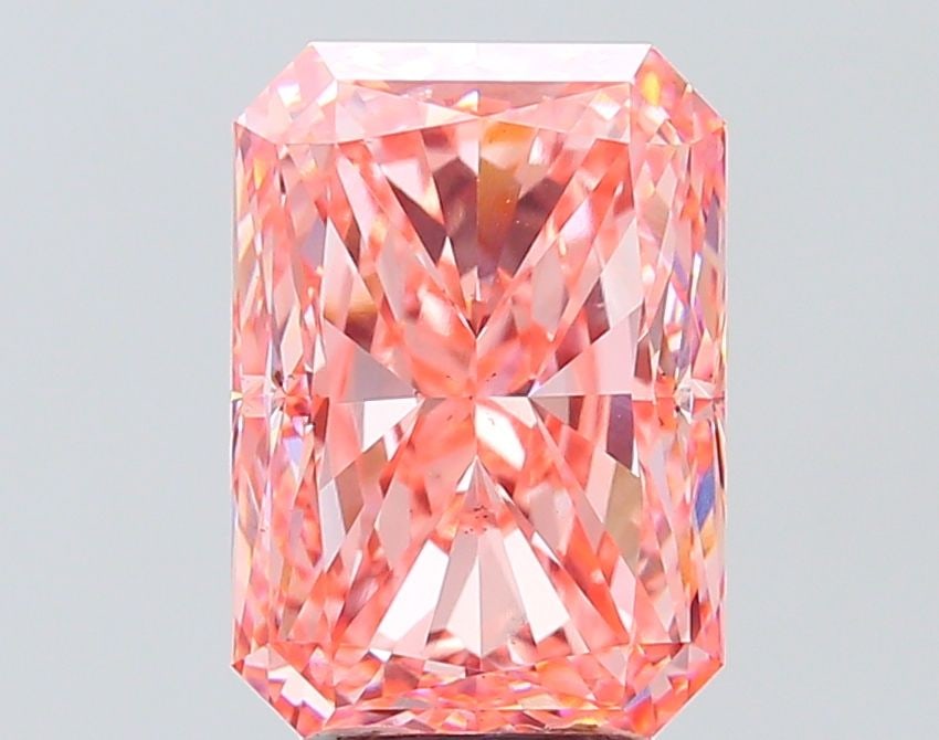 Loose Diamond - RADIANT 5.59ct Fancy Vivid Pink VS2: Loose Diamond - RADIANT 5.59ct Fancy Vivid Pink VS2 Source: This is a real non-mined Diamond that has been grown in a lab Shape: RADIANT Carats: 5.59 Color: Fancy Vivid Pink Certification: IGI Video: