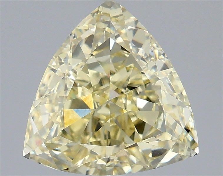 Loose Diamond - TRIANGULAR 3.07ct Fancy Yellow VVS2: Loose Diamond - TRIANGULAR 3.07ct Fancy Yellow VVS2 Source: This is a real non-mined Diamond that has been grown in a lab Shape: TRIANGULAR Carats: 3.07 Color: Fancy Yellow Certification: IGI Video: