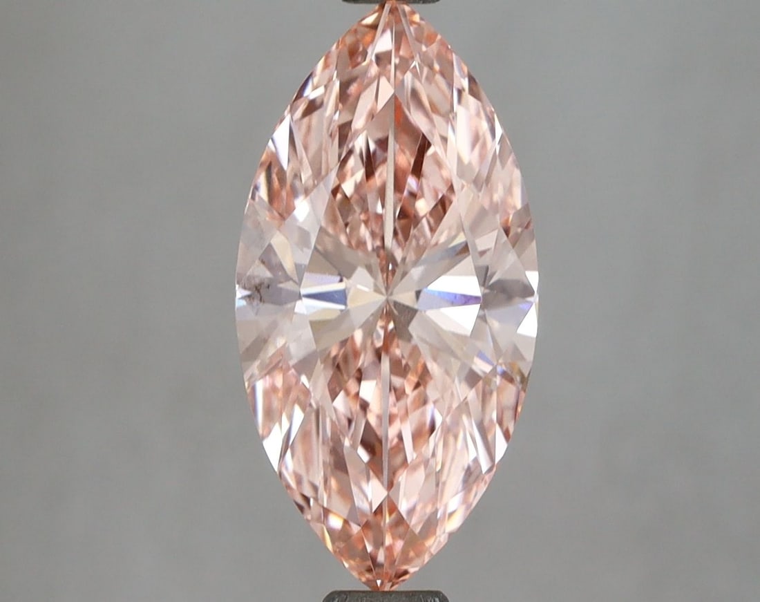Loose Diamond - MARQUISE 2.58ct Fancy Vivid Pink VVS2: Loose Diamond - MARQUISE 2.58ct Fancy Vivid Pink VVS2 Source: This is a real non-mined Diamond that has been grown in a lab Shape: MARQUISE Carats: 2.58 Color: Fancy Vivid Pink Certification: IGI Vide