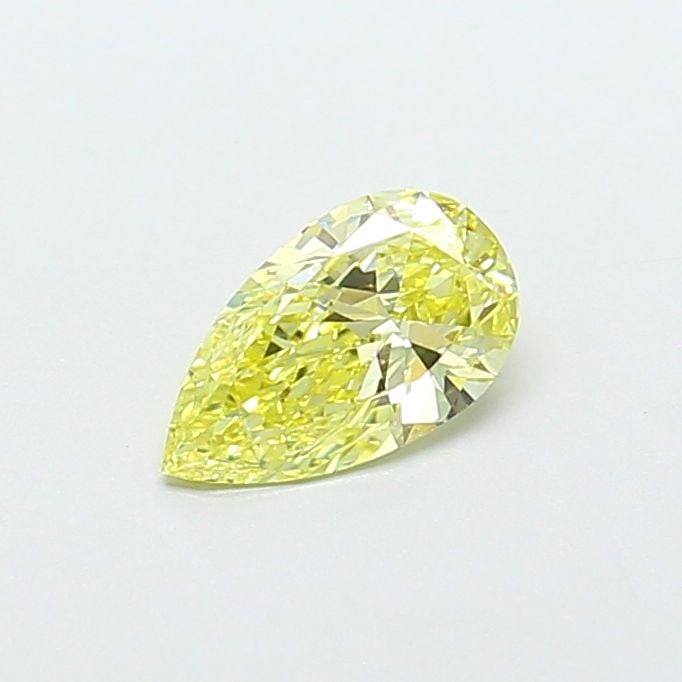 Loose Diamond - PEAR 0.68ct Fancy Yellow VVS2: Loose Diamond - PEAR 0.68ct Fancy Yellow VVS2 Source: This is a real non-mined Diamond that has been grown in a lab Shape: PEAR Carats: 0.68 Color: Fancy Yellow Certification: IGI PLEASE NOTE: Framed,