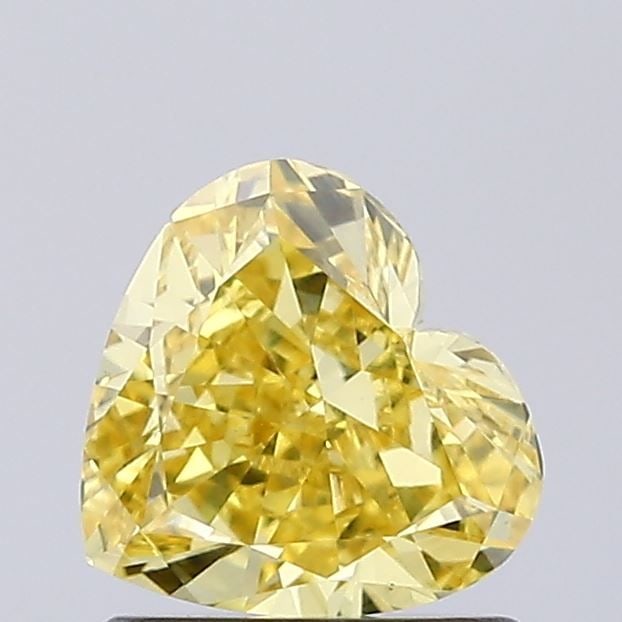 Loose Diamond - HEART 0.88ct Fancy Vivid Yellow VS1: Loose Diamond - HEART 0.88ct Fancy Vivid Yellow VS1 Source: This is a real non-mined Diamond that has been grown in a lab Shape: HEART Carats: 0.88 Color: Fancy Vivid Yellow Certification: IGI Video: