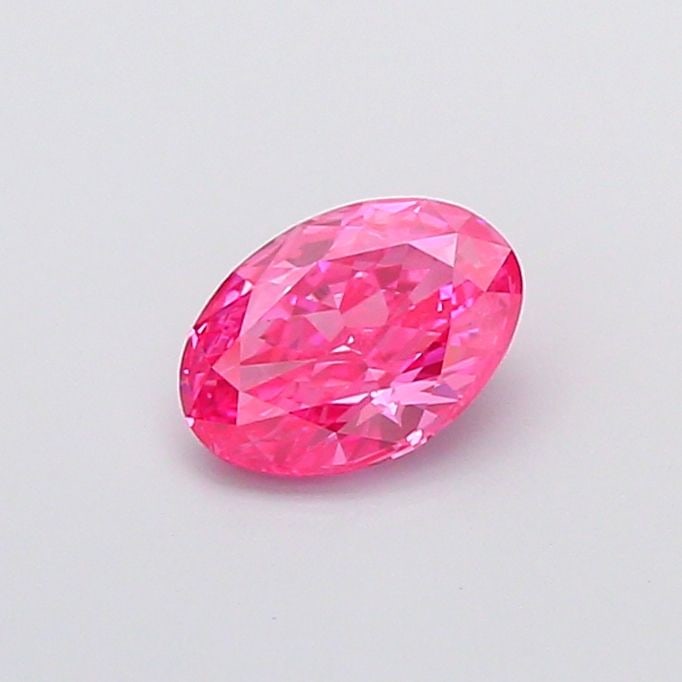 Loose Diamond - OVAL 1.08ct Fancy Vivid Pink VS1: Loose Diamond - OVAL 1.08ct Fancy Vivid Pink VS1 Source: This is a real non-mined Diamond that has been grown in a lab Shape: OVAL Carats: 1.08 Color: Fancy Vivid Pink Certification: IGI Video: