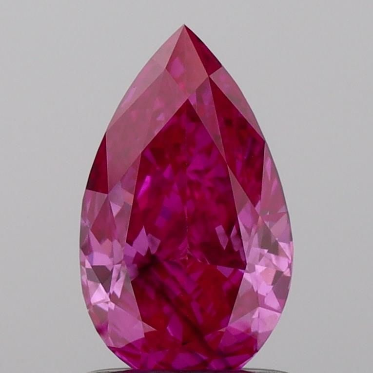 Loose Diamond - PEAR 0.96ct Fancy Vivid Pink SI1: Loose Diamond - PEAR 0.96ct Fancy Vivid Pink SI1 Source: This is a real non-mined Diamond that has been grown in a lab Shape: PEAR Carats: 0.96 Color: Fancy Vivid Pink Certification: IGI Video: