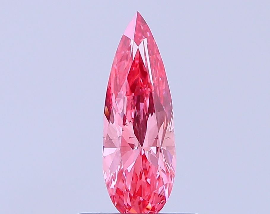 Loose Diamond - PEAR 0.54ct Fancy Vivid Pink VS2: Loose Diamond - PEAR 0.54ct Fancy Vivid Pink VS2 Source: This is a real non-mined Diamond that has been grown in a lab Shape: PEAR Carats: 0.54 Color: Fancy Vivid Pink Certification: IGI Video: