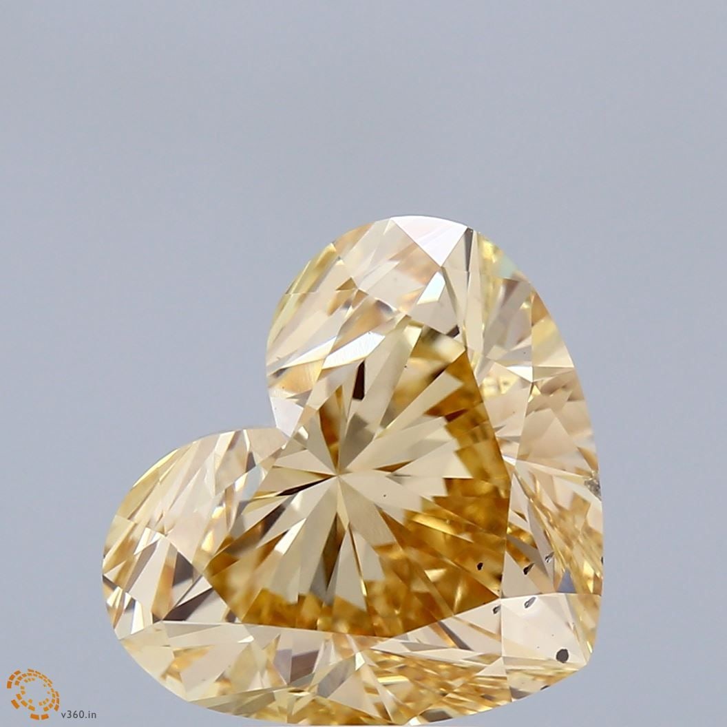 Loose Diamond - HEART 5.95ct Fancy Intense Brownish Yellow VS2: Loose Diamond - HEART 5.95ct Fancy Intense Brownish Yellow VS2 Source: This is a real non-mined Diamond that has been grown in a lab Shape: HEART Carats: 5.95 Color: Fancy Intense Brownish Yellow