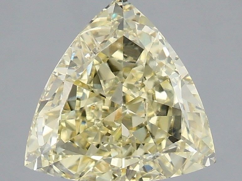 Loose Diamond - TRIANGULAR 2.1ct Fancy Yellow VS1: Loose Diamond - TRIANGULAR 2.1ct Fancy Yellow VS1 Source: This is a real non-mined Diamond that has been grown in a lab Shape: TRIANGULAR Carats: 2.1 Color: Fancy Yellow Certification: IGI Video:
