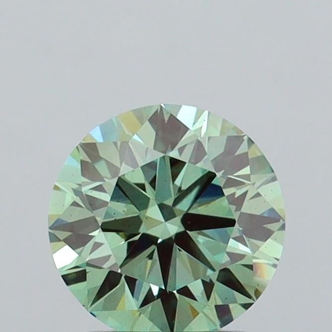 Ideal Loose Diamond - ROUND 1.53ct Fancy Vivid Green VS2: Ideal Loose Diamond - ROUND 1.53ct Fancy Vivid Green VS2 Source: This is a real non-mined Diamond that has been grown in a lab Shape: ROUND Carats: 1.53 Color: Fancy Vivid Green Certification: IGI Vid