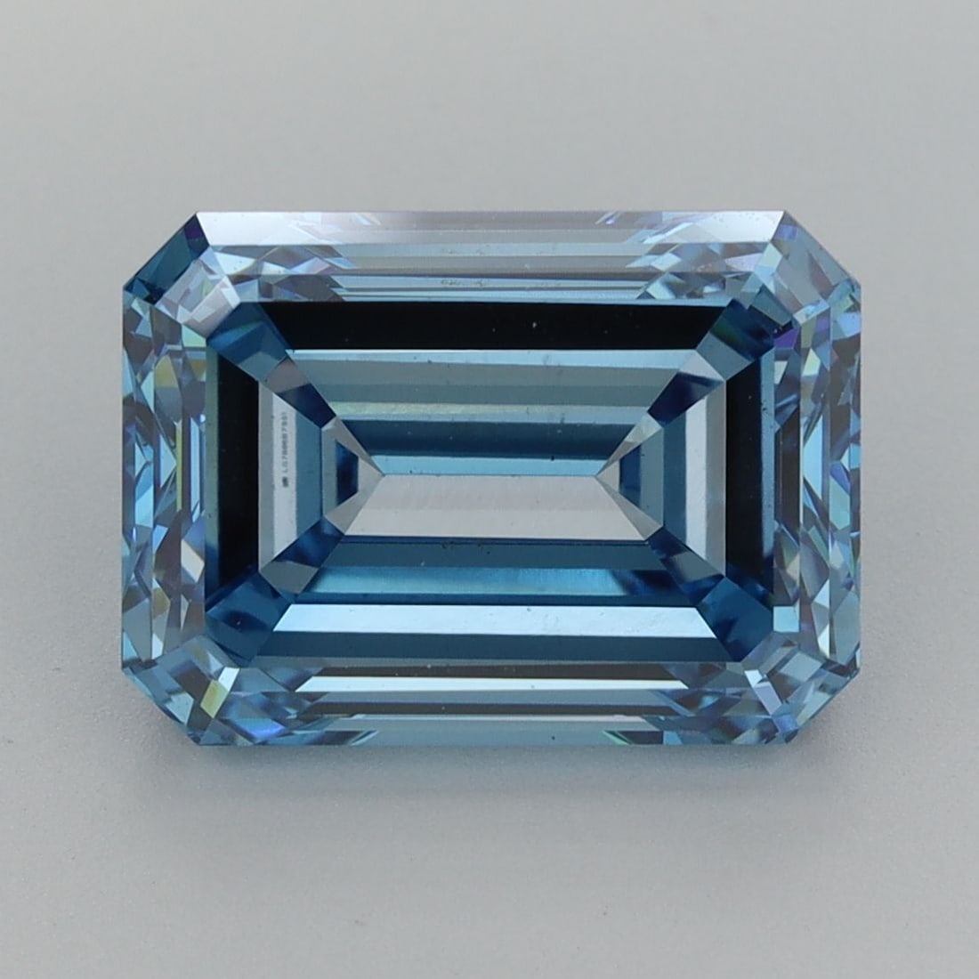 Loose Diamond - EMERALD 4.98ct Fancy Vivid Blue VS1: Loose Diamond - EMERALD 4.98ct Fancy Vivid Blue VS1 Source: This is a real non-mined Diamond that has been grown in a lab Shape: EMERALD Carats: 4.98 Color: Fancy Vivid Blue Certification: IGI PLEASE 