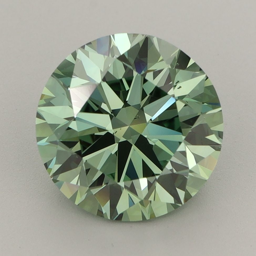 Loose Diamond - ROUND 3.98ct Fancy Vivid Green VS2: Loose Diamond - ROUND 3.98ct Fancy Vivid Green VS2 Source: This is a real non-mined Diamond that has been grown in a lab Shape: ROUND Carats: 3.98 Color: Fancy Vivid Green Certification: IGI Video: