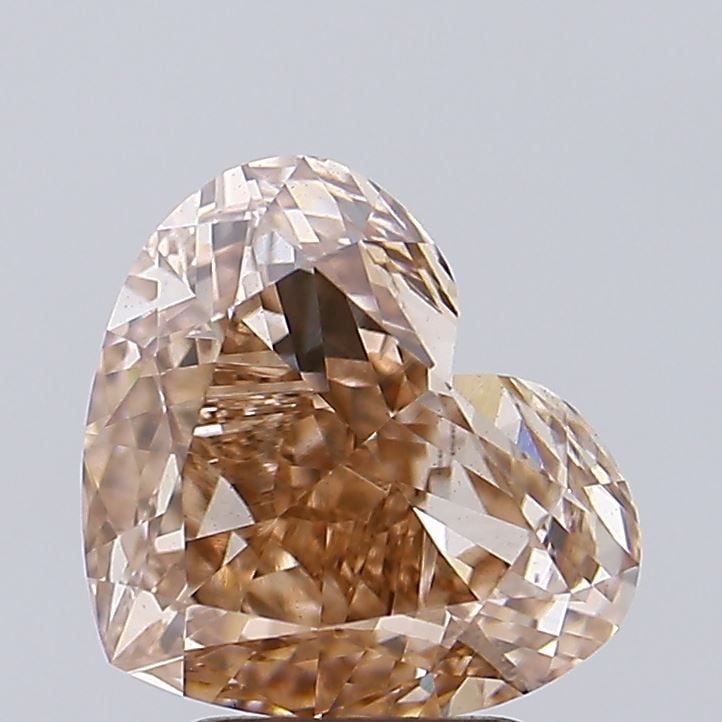 Loose Diamond - HEART 3.14ct Fancy Brown VS2: Loose Diamond - HEART 3.14ct Fancy Brown VS2 Source: This is a real non-mined Diamond that has been grown in a lab Shape: HEART Carats: 3.14 Color: Fancy Brown Certification: IGI Video: