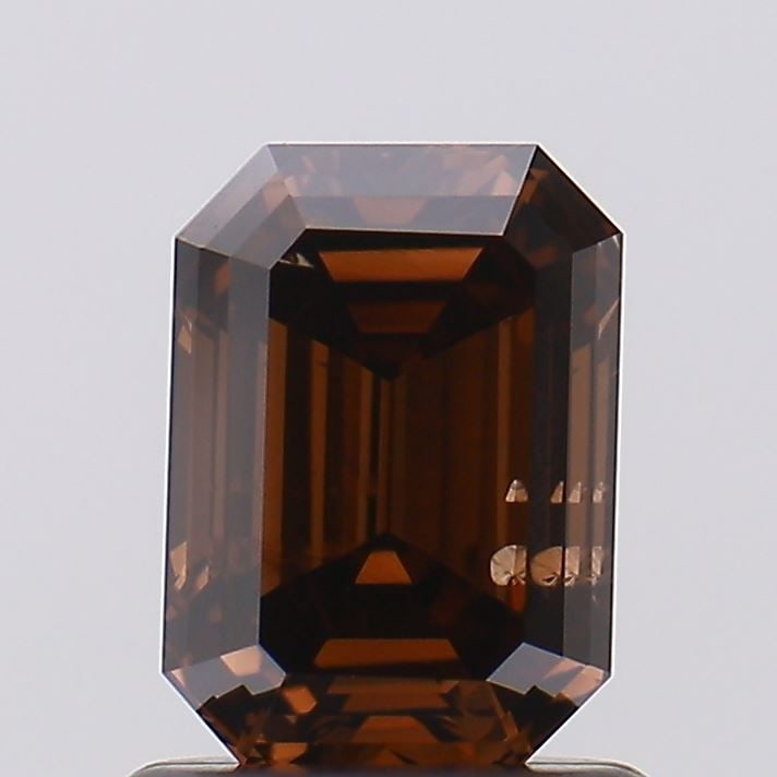 Loose Diamond - EMERALD 1.05ct Fancy Deep Brown SI2: Loose Diamond - EMERALD 1.05ct Fancy Deep Brown SI2 Source: This is a real non-mined Diamond that has been grown in a lab Shape: EMERALD Carats: 1.05 Color: Fancy Deep Brown Certification: IGI Video: