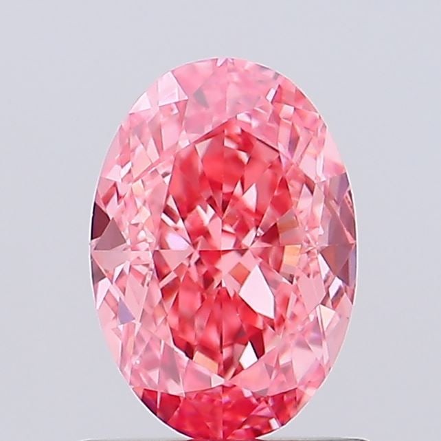 Loose Diamond - OVAL 1.28ct Fancy Vivid Pink VS1: Loose Diamond - OVAL 1.28ct Fancy Vivid Pink VS1 Source: This is a real non-mined Diamond that has been grown in a lab Shape: OVAL Carats: 1.28 Color: Fancy Vivid Pink Certification: IGI Video: Video