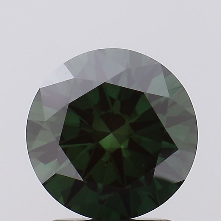 Loose Diamond - ROUND 2.11ct Fancy Deep Green VS1: Loose Diamond - ROUND 2.11ct Fancy Deep Green VS1 Source: This is a real non-mined Diamond that has been grown in a lab Shape: ROUND Carats: 2.11 Color: Fancy Deep Green Certification: IGI Video: