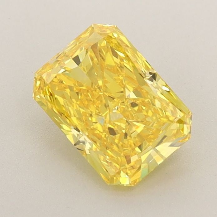 Loose Diamond - RADIANT 0.91ct Fancy Vivid Yellow VVS2: Loose Diamond - RADIANT 0.91ct Fancy Vivid Yellow VVS2 Source: This is a real non-mined Diamond that has been grown in a lab Shape: RADIANT Carats: 0.91 Color: Fancy Vivid Yellow Certification: IGI